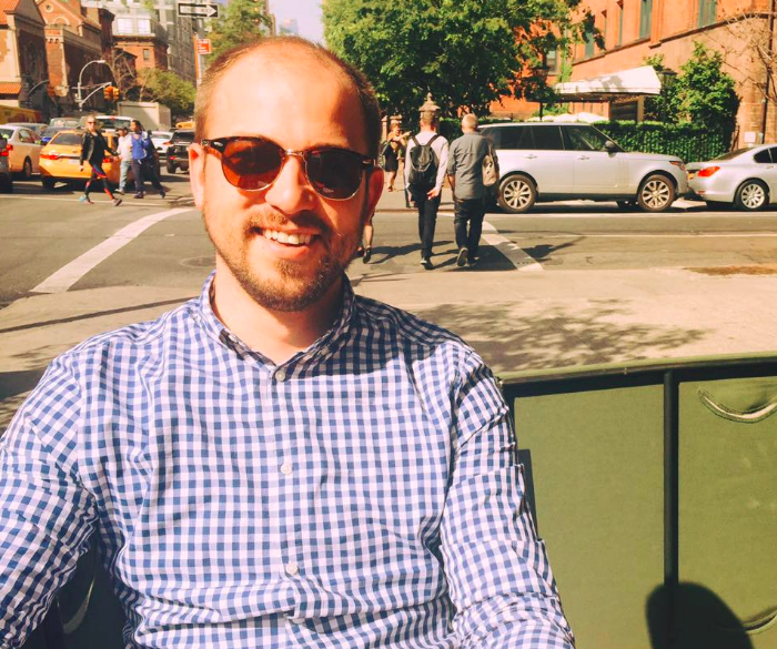 A photo of Dom Garrett smiling